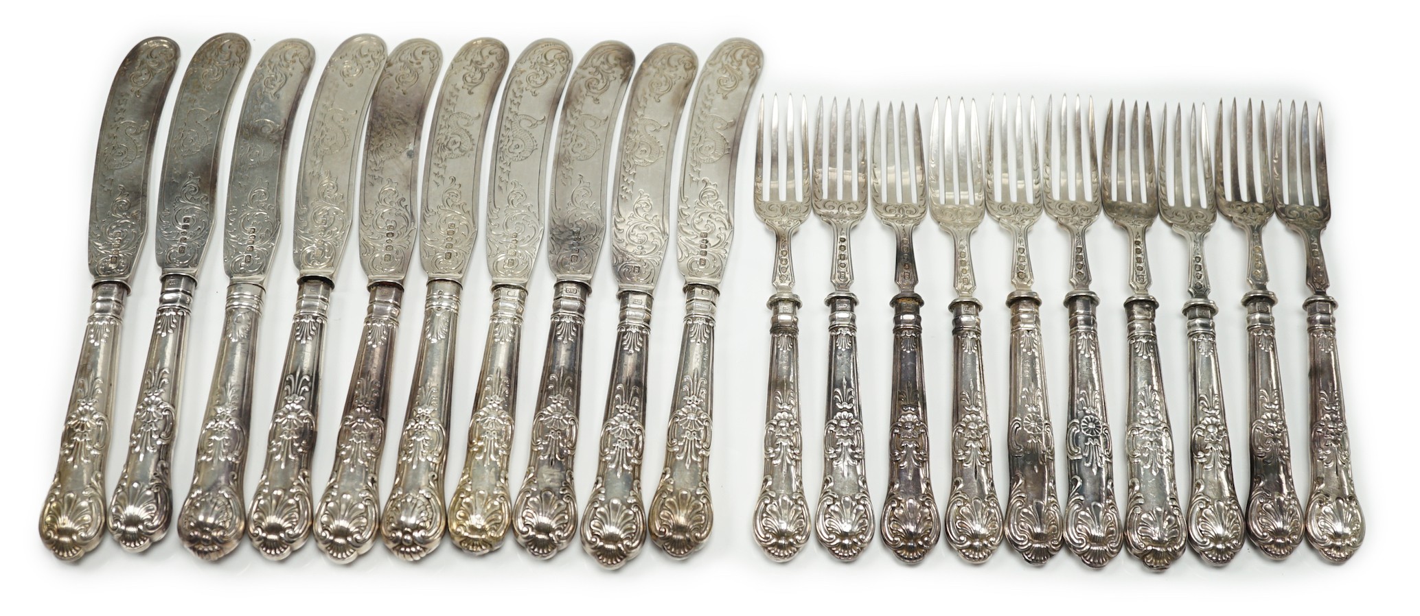 A set of ten pairs of Victorian silver Queen's pattern dessert eaters, maker, JG, Birmingham, 1856/7, loaded handles.
